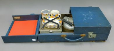 An early 20th century Sirram Folding Fitted Table picnic set. 54 cm wide when closed.