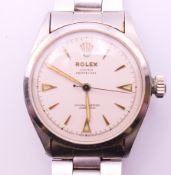 A Rolex Oyster Perpetual stainless steel gentlemen's wristwatch with paperwork. 3.5 cm diameter.