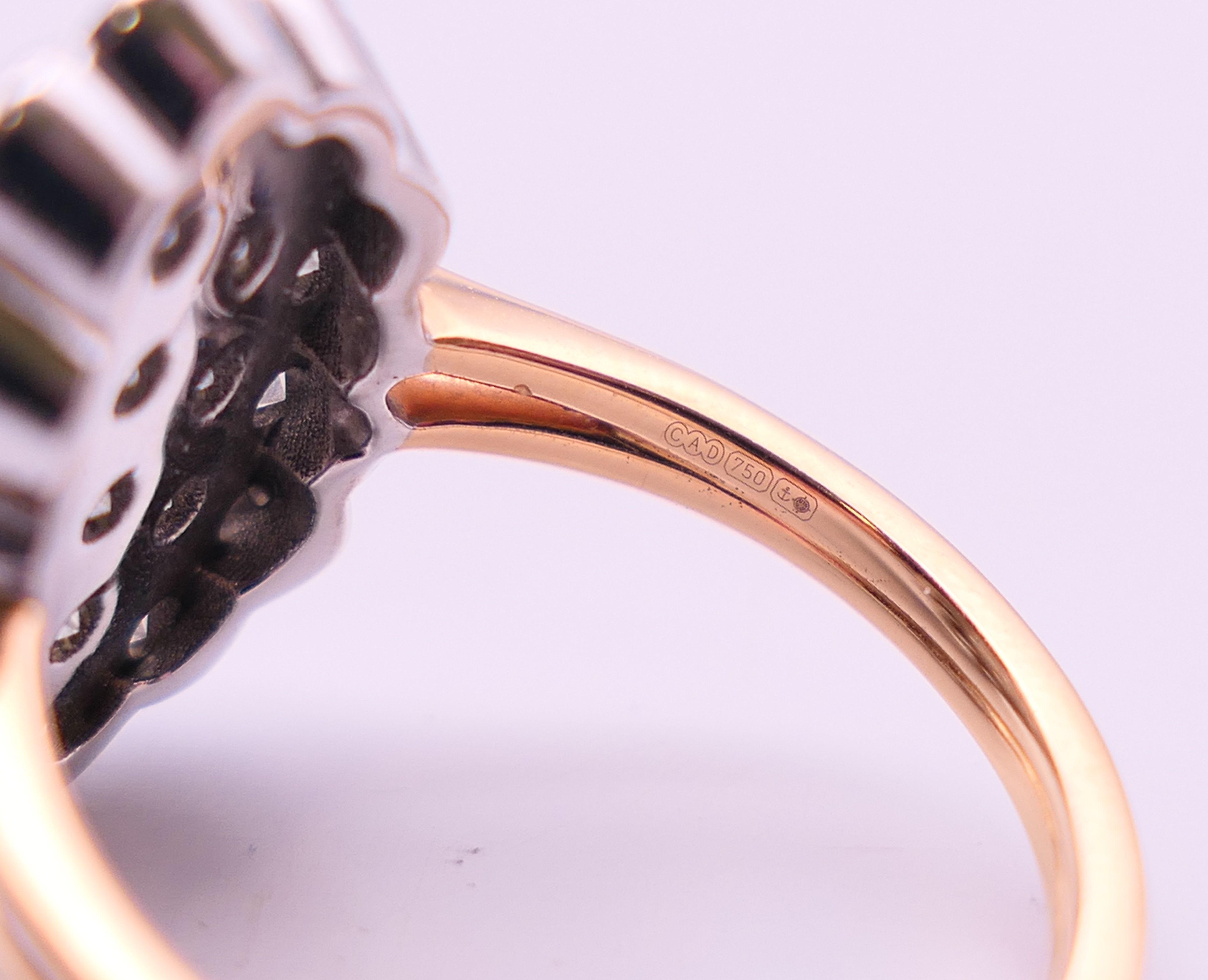 An unmarked gold diamond cluster ring. Ring size Q/R. - Image 4 of 5