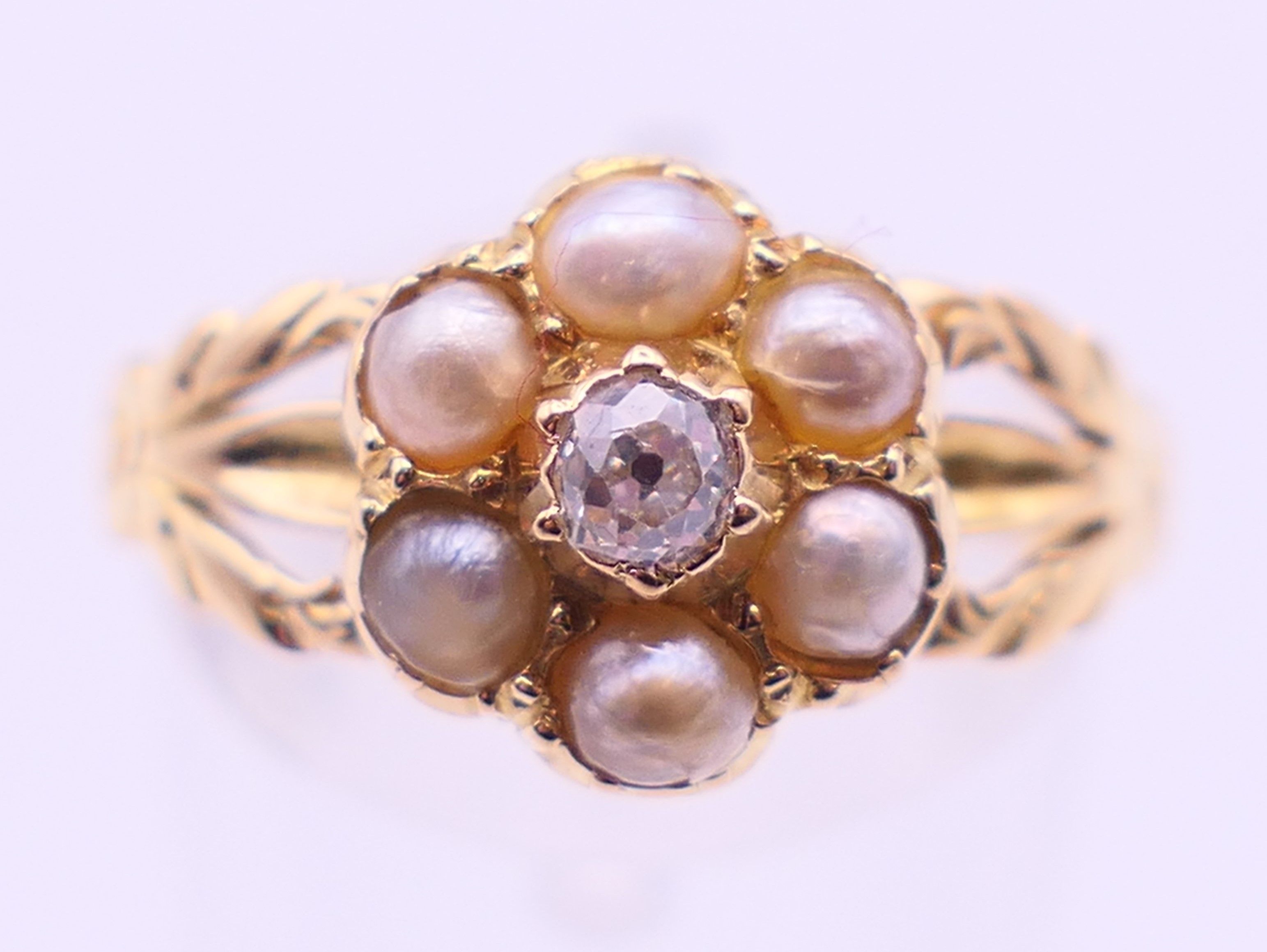 An unmarked gold, diamond and seed pearl ring, and another unmarked gold and seed pearl ring. - Image 7 of 11