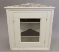 A 19th century painted pine corner cabinet. 100 cm wide.