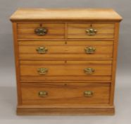 A Victorian satin walnut chest of drawers. 106 cm wide.