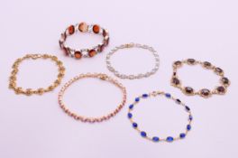 A quantity of stone set 9 ct gold bracelets. Pink stone bracelet 18.