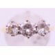An 18 ct gold three stone diamond ring. Ring size P. - Image 1 of 5