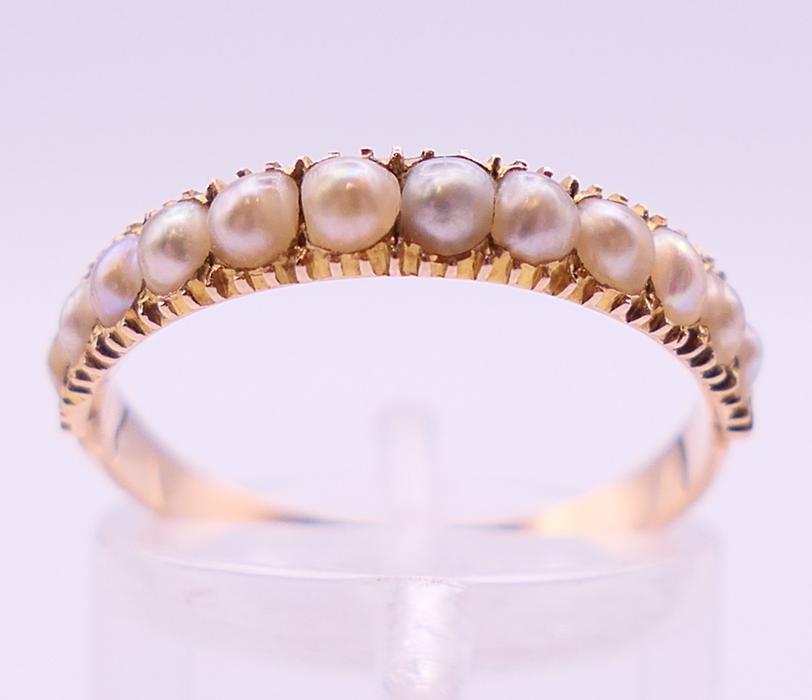 An unmarked gold, diamond and seed pearl ring, and another unmarked gold and seed pearl ring. - Image 3 of 11