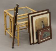 Two bamboo tables, three pictures and three walking sticks, two with silver handles.