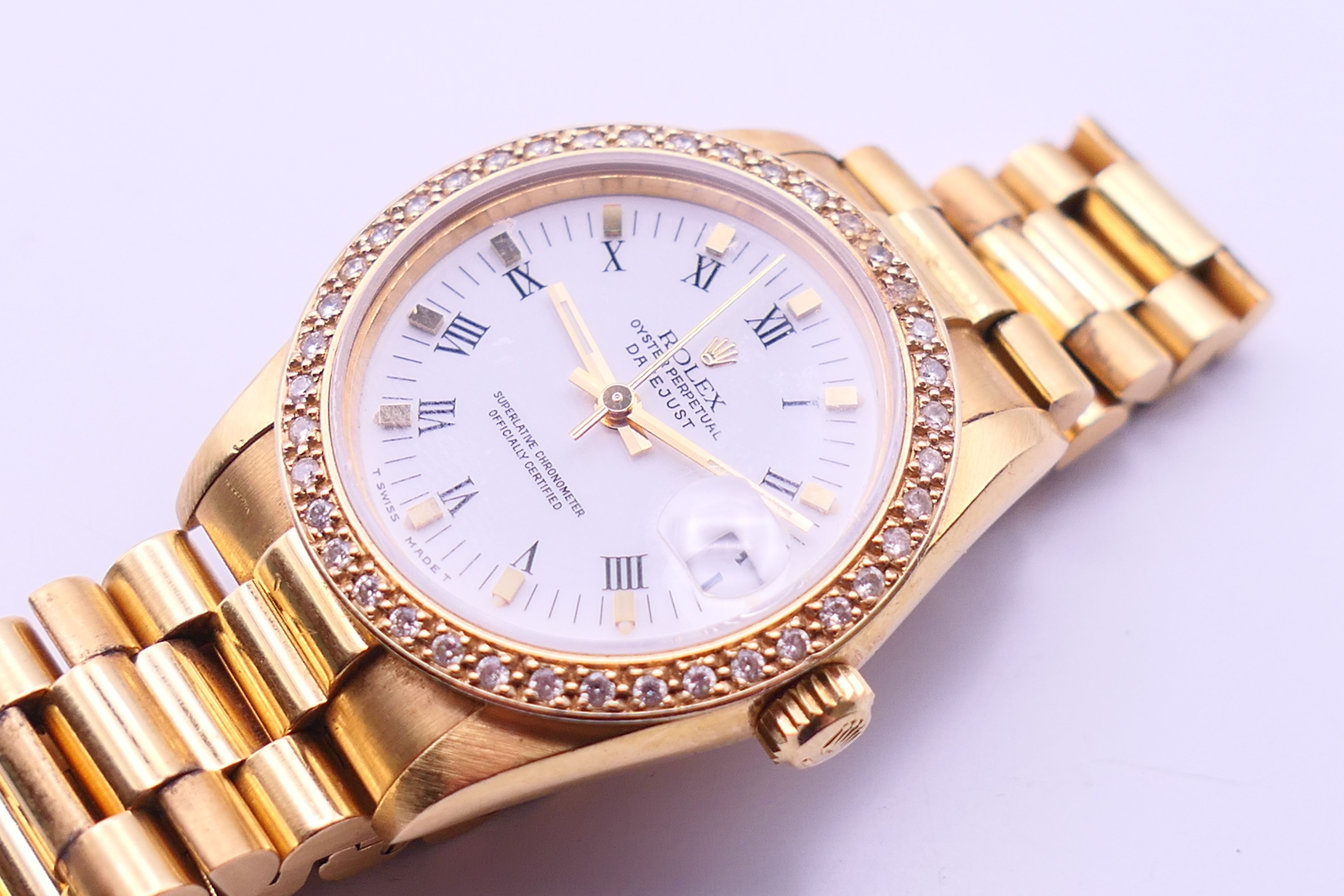 An 18 ct gold Rolex Oyster Perpetual Datejust chronometer wristwatch with associated diamond bezel - Image 3 of 12