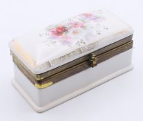 An antique porcelain box with metal mounts. 10 cm long x 4.5 cm deep x 4.5 cm high.