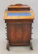 A Victorian inlaid walnut Davenport. 53 cm wide.