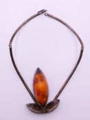 A silver drop necklace. Drop 6.5 cm high.