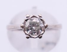 An 18 ct white gold and diamond solitaire ring. The stone spreading to between 0.5-0.75 ct.