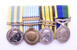 A group of four Elizabeth II medals, to include the Korea medal,