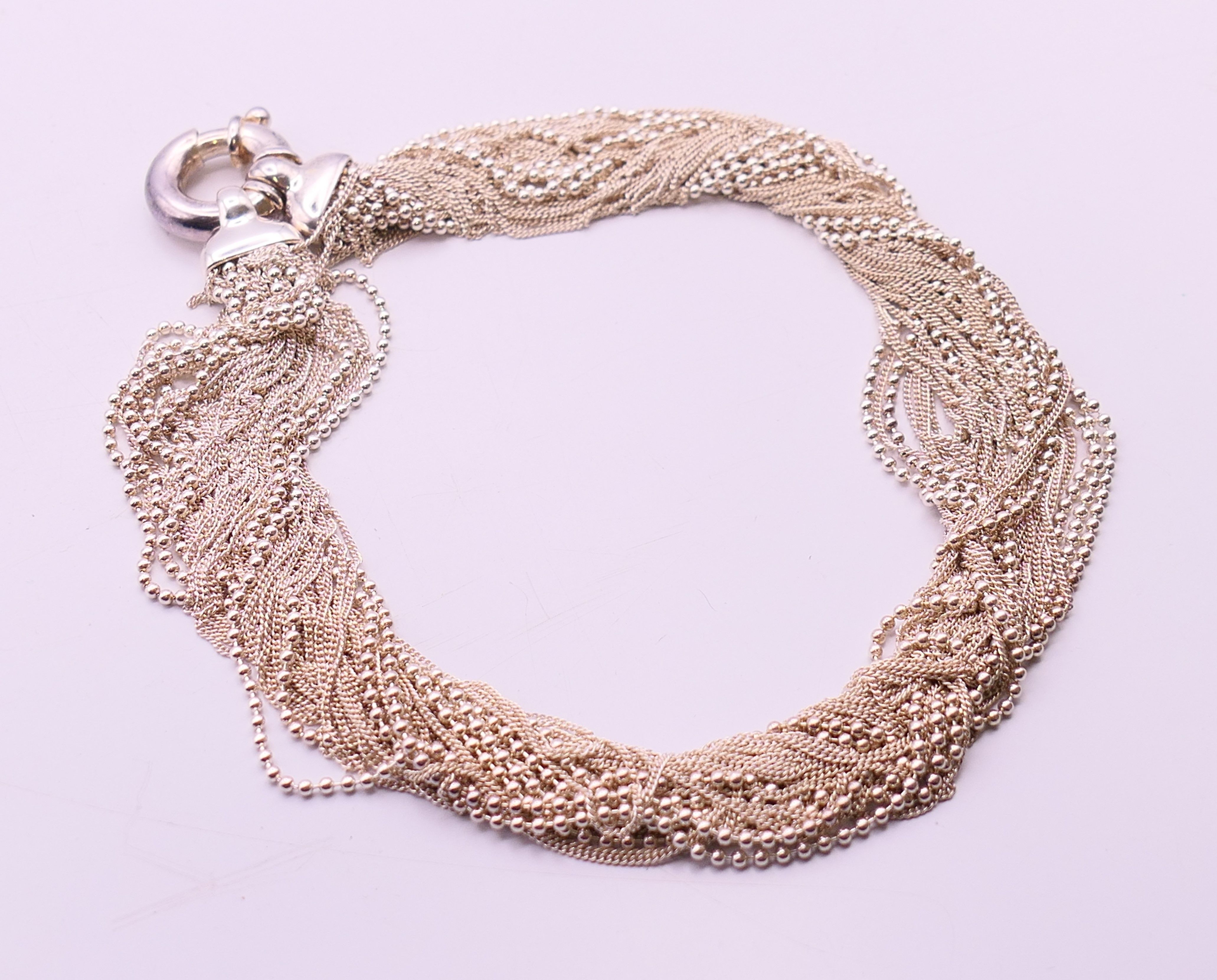 A silver charm bracelet and a silver necklace. The later 34 cm long. - Image 2 of 9
