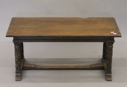 An oak coffee table. 91.5 cm long.
