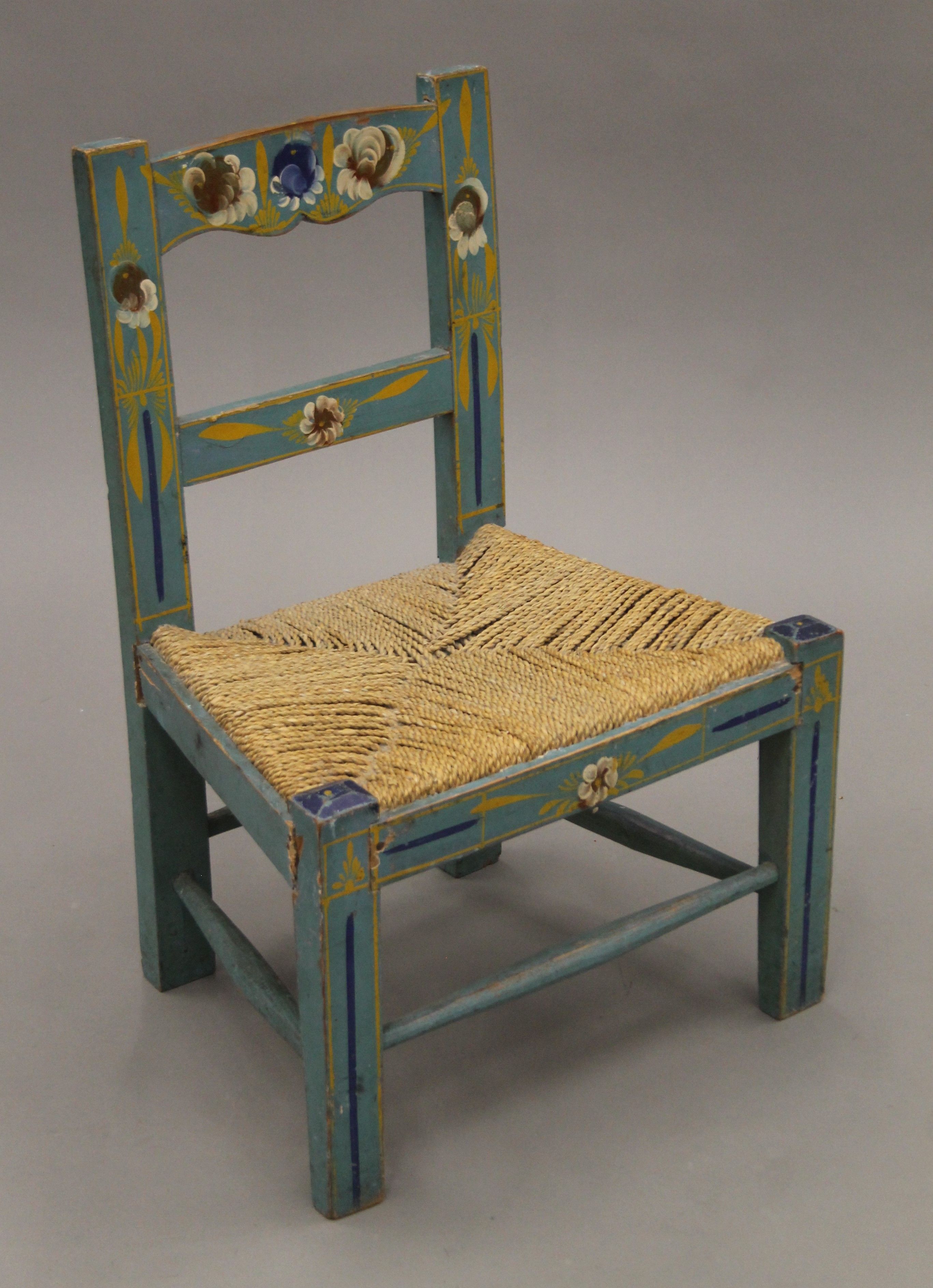 A florally-painted child's chair. 43 cm wide. - Image 3 of 4