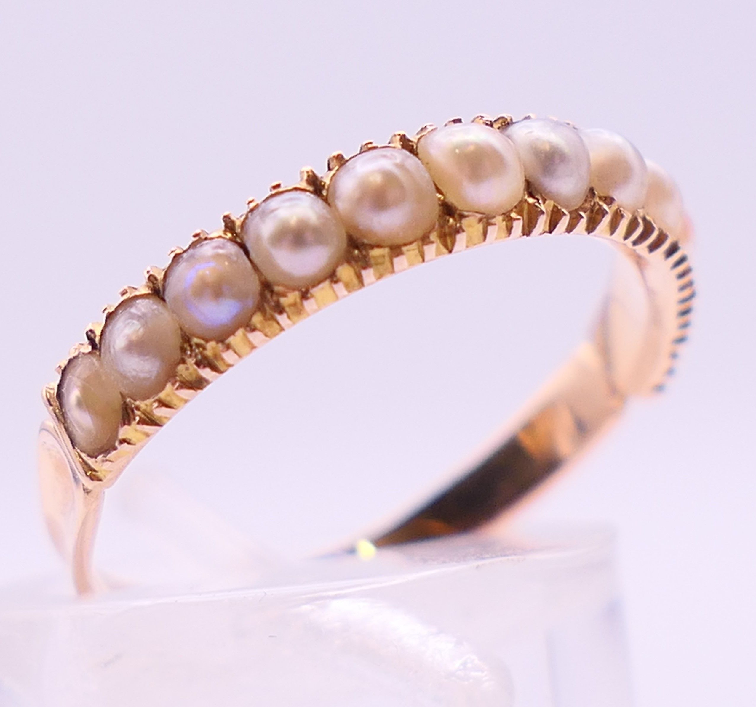 An unmarked gold, diamond and seed pearl ring, and another unmarked gold and seed pearl ring. - Image 4 of 11