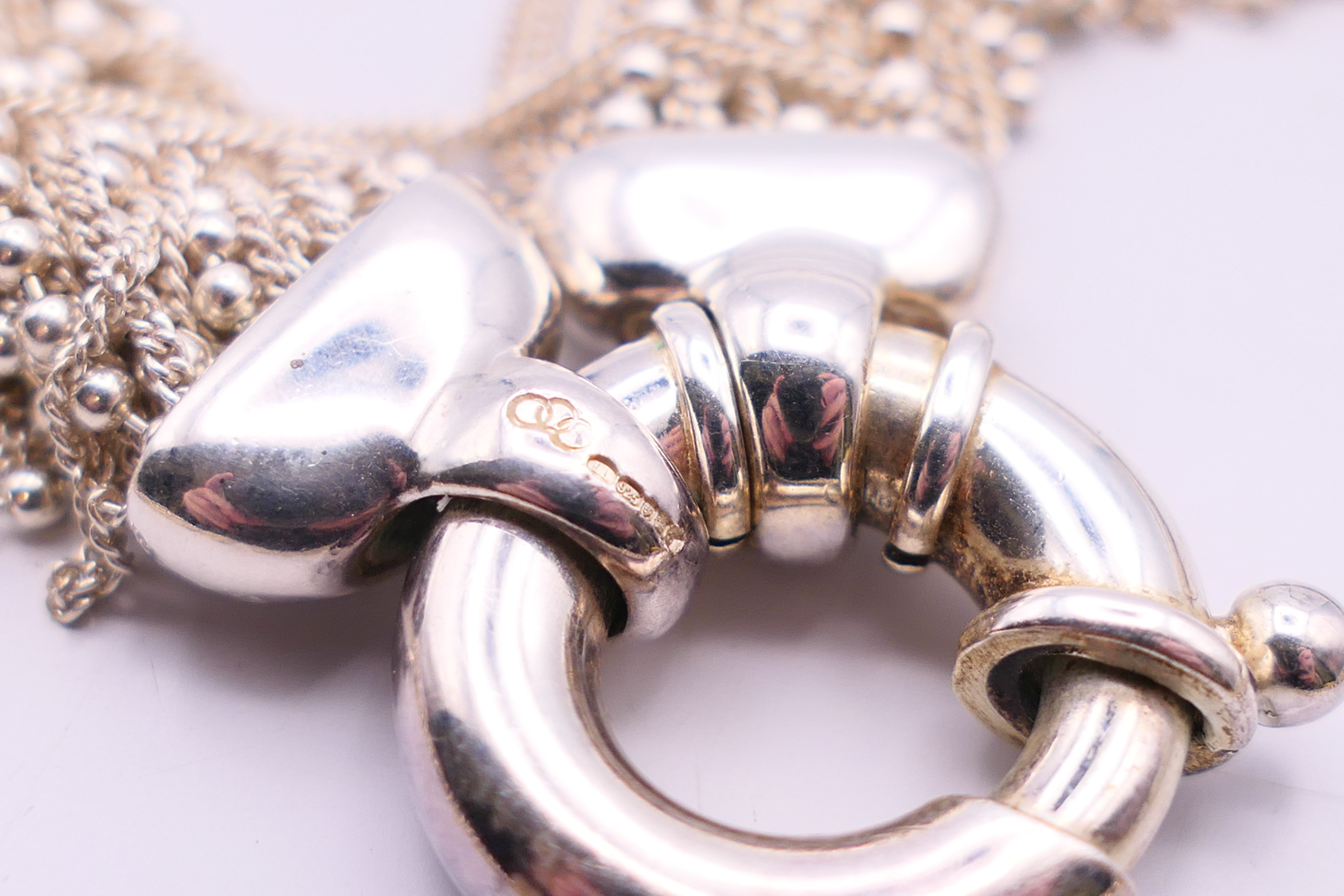 A silver charm bracelet and a silver necklace. The later 34 cm long. - Image 5 of 9