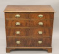 A 19th century walnut chest of drawers. 100 cm wide.
