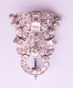 An unmarked Art Deco diamond brooch. 2.5 cm high. 5 grammes total weight.