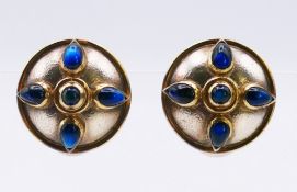 A pair of silver gilt clip-on lotus stud earrings by Contemporary Jeweller Poppy Dandiya,