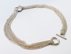 A Tiffany & Co silver necklace, Elsa Peretti open heart multi-chain design. 45 cm long.