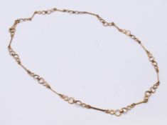 A 9 ct gold necklace. 68 cm long. 16.7 grammes.