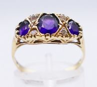 A 9 ct gold and amethyst ring. Ring size P.