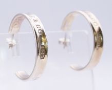 A pair of Tiffany & Co silver hoop earrings, 1837 design. 2.5 cm high.