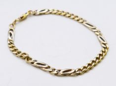 An 18 ct gold figaro chain bracelet. 18 cm long. 11.4 grammes.