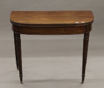 A 19th century mahogany tea table. 91 cm wide.