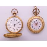 Two 18 K gold ladies' fob watches and a gold-plated chain with 9 ct gold T-bar.