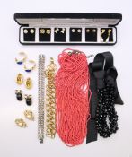 A quantity of designer jewellery, to include a box of Pierre Cardin earrings,