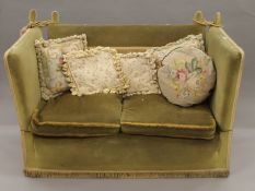 A vintage Knowle settee. 145 cm wide.
