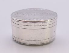 A Georgian silver oval nutmeg grater. 2 cm high.