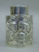 A silver tea caddy decorated with embossed angels. 9.5 cm high. 87.4 grammes.
