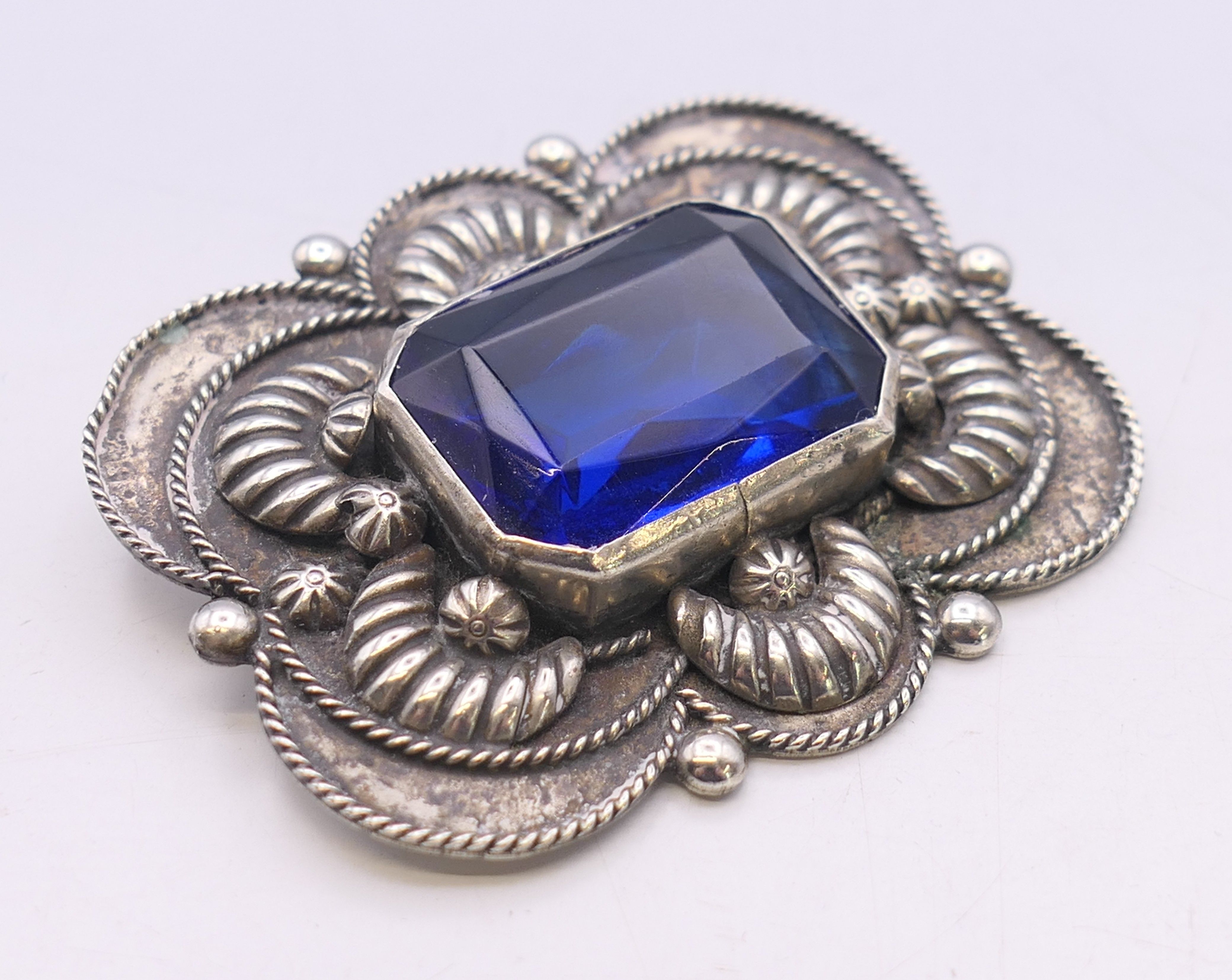 An Italian silver brooch with blue central stone. 5.25 cm x 4.5 cm. - Image 2 of 4