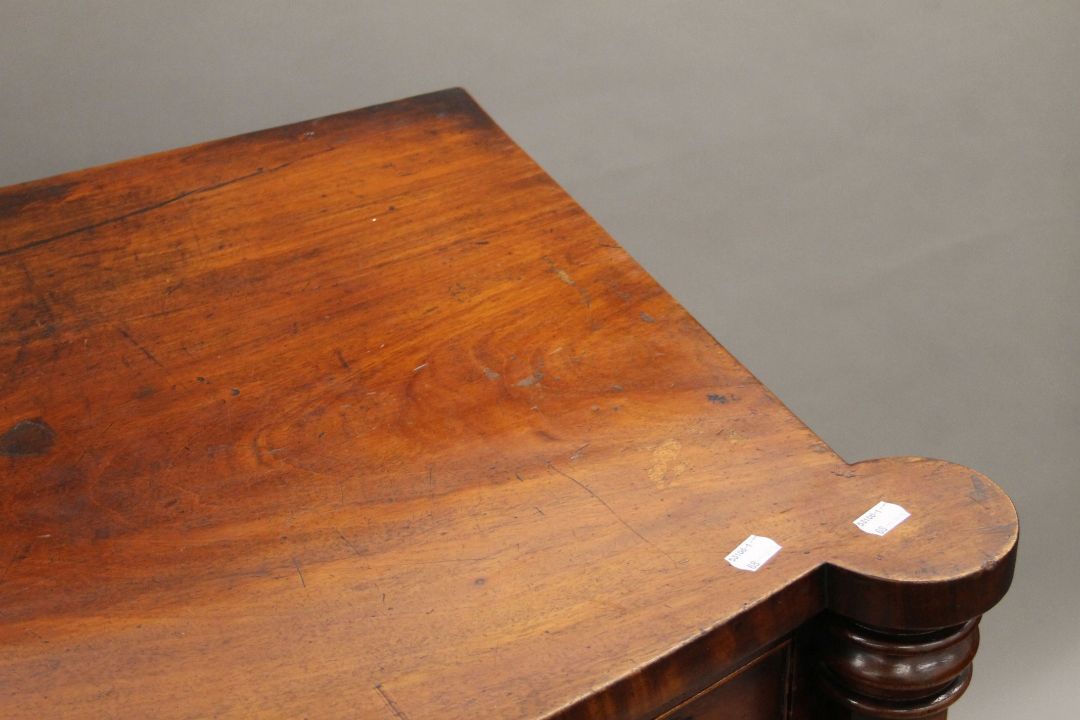 A Georgian mahogany bow-front two-over-three chest of drawers. 124 cm wide x 114 cm high. - Image 4 of 7