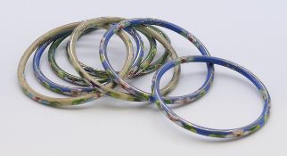 Seven cloisonne bangles. 0.5 cm high, 0.5 cm wide, 6.5 internal diameter.
