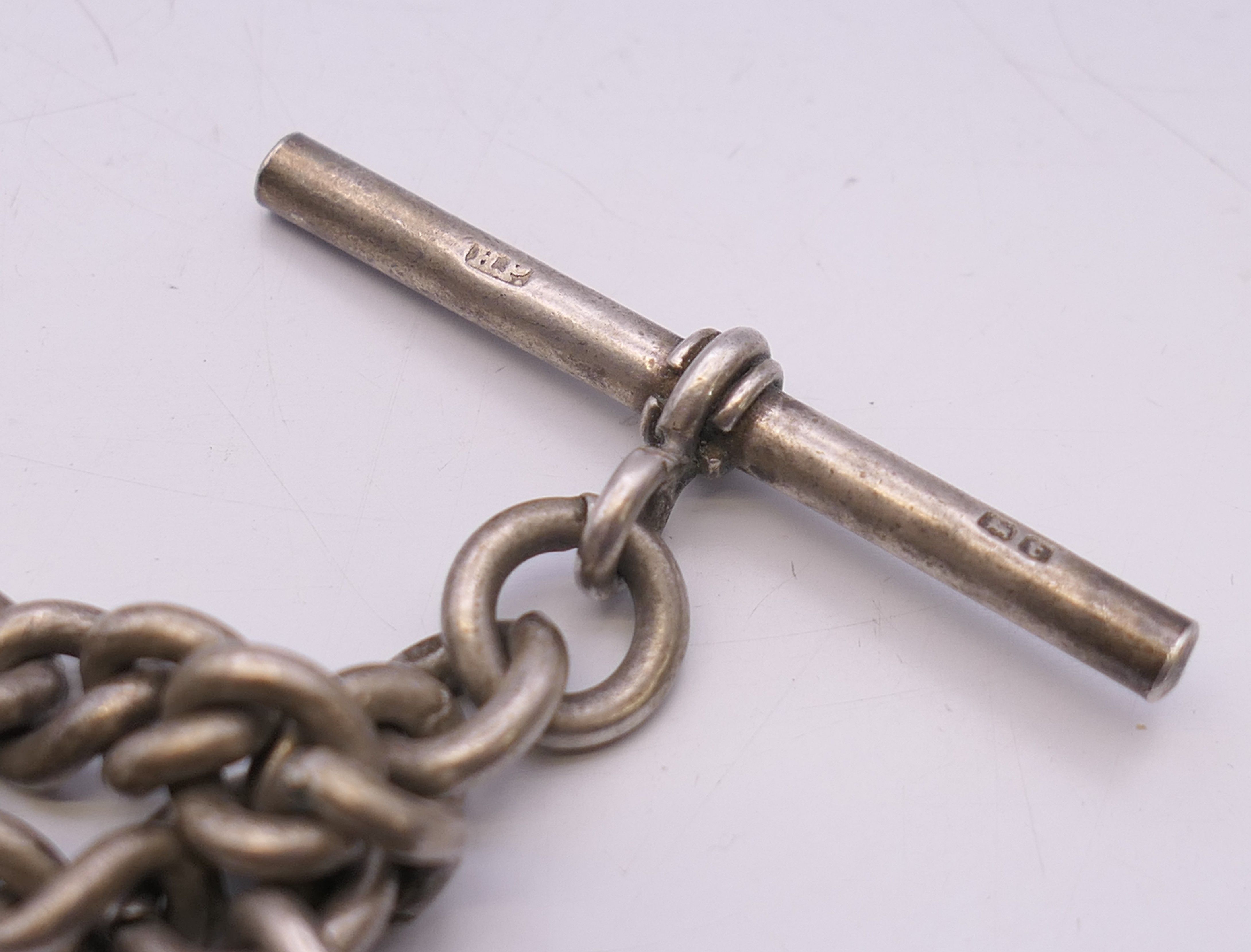 A silver Albert pocket watch chain and fob, the fob engraved AJR 1901 HQC. 38 cm long, fob 3. - Image 4 of 6