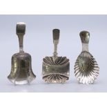 Three Georgian silver caddy spoons. Largest 8.5 cm high.