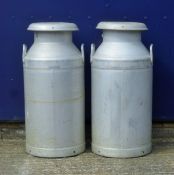 Two milk churns. Each 74 cm high.
