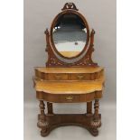 A Victorian mahogany duchess dressing table. 105 cm wide.