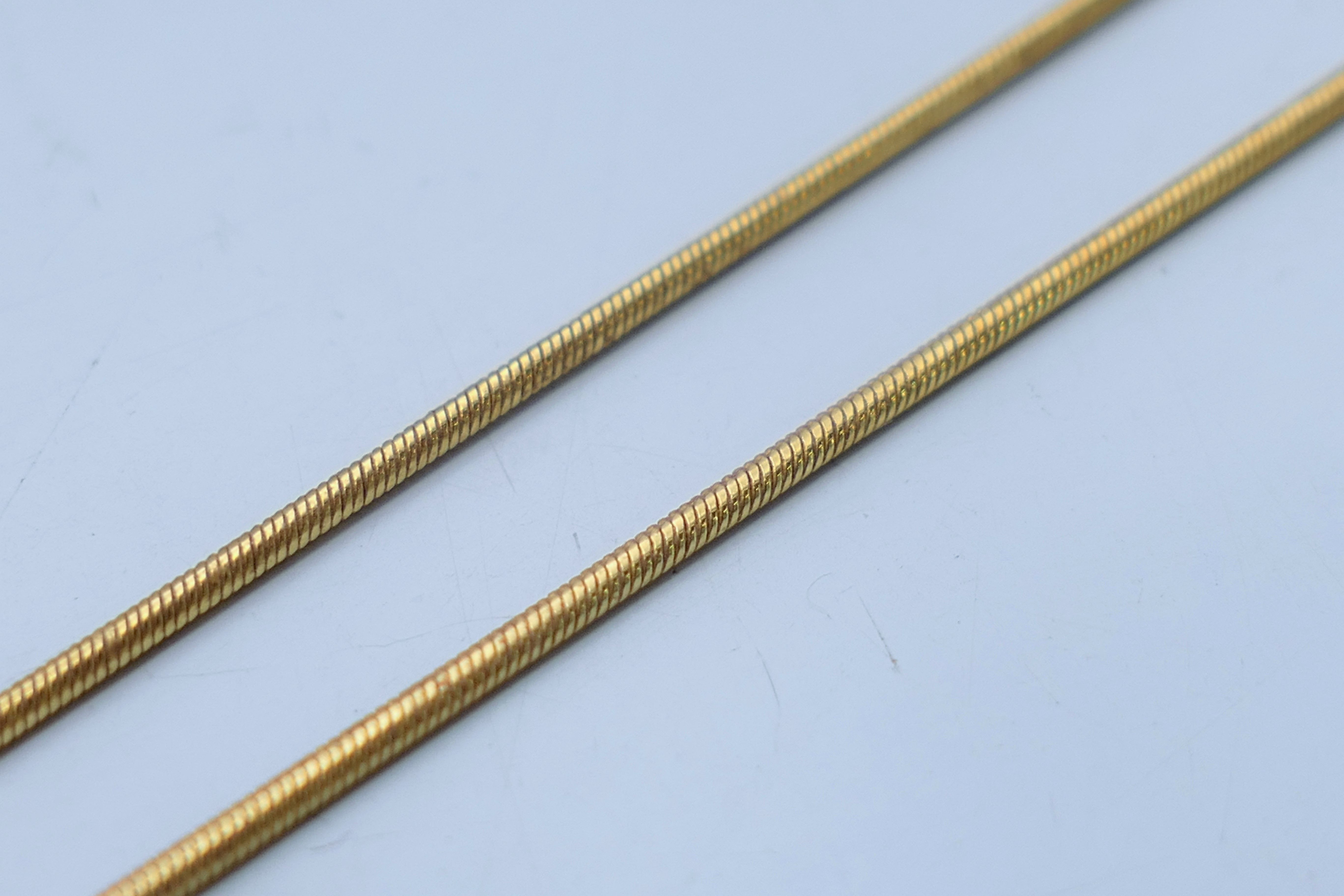 An 18 ct gold tourmaline pendant and chain. Pendant 1. - Image 2 of 3