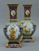 A pair of Chinese porcelain vases. 28 cm high.