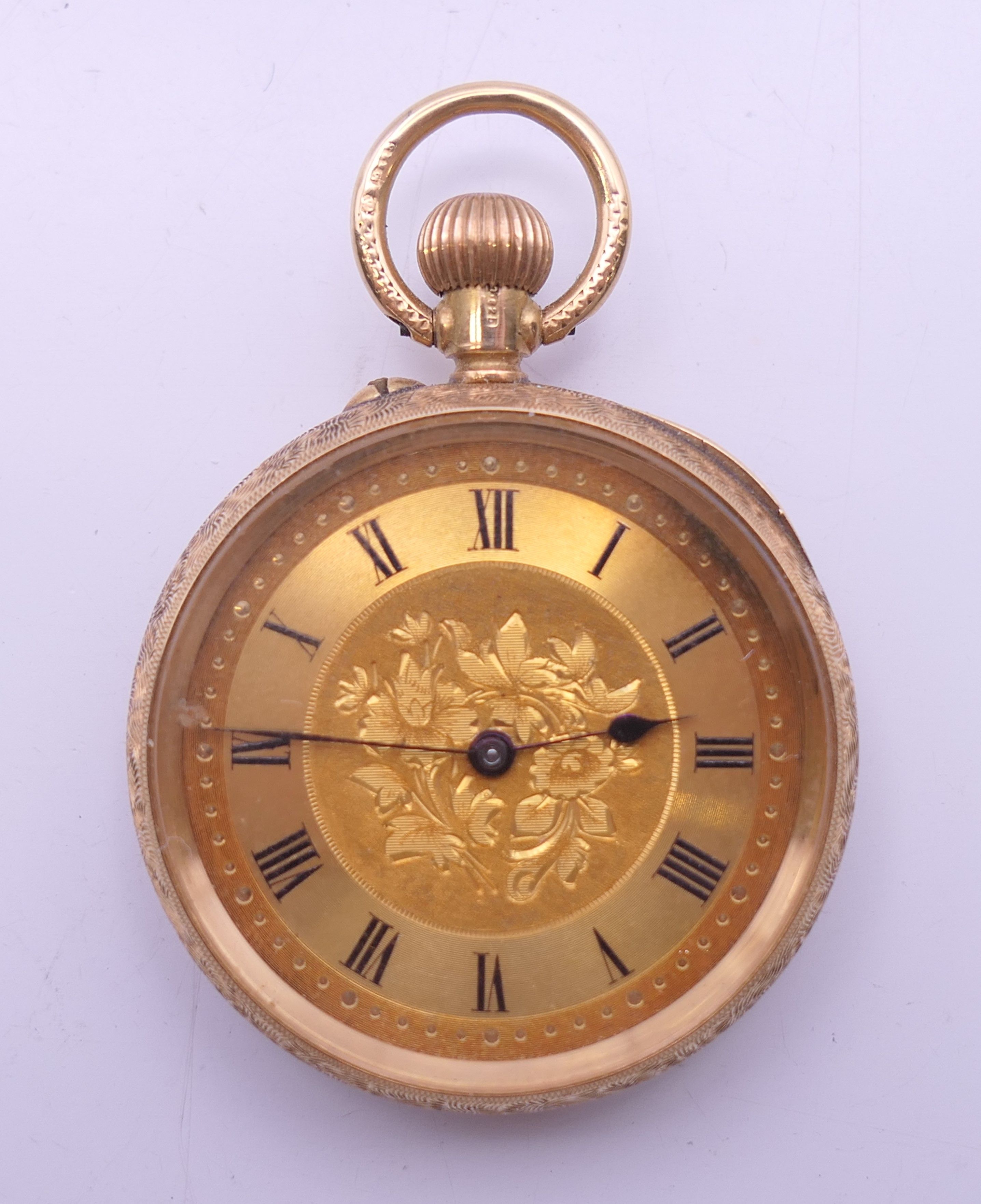 A 15 K gold J W Benson fob watch. 3.5 cm diameter. 29.5 grammes total weight.
