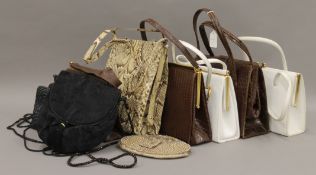 A quantity of vintage leather handbags, including a James Florsheim of London, a Winsley,