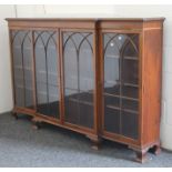 An Edwardian mahogany glazed display cabinet. 182 cm wide x 115 cm high.