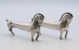 Two WMF horse form knife rests. 8.5 cm x 4.5 cm.