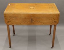 A Victorian inlaid satinwood Pembroke table. 51 cm wide with flaps down.