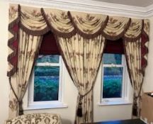 A set of three floral lined pencil-pleat curtains and a rail,